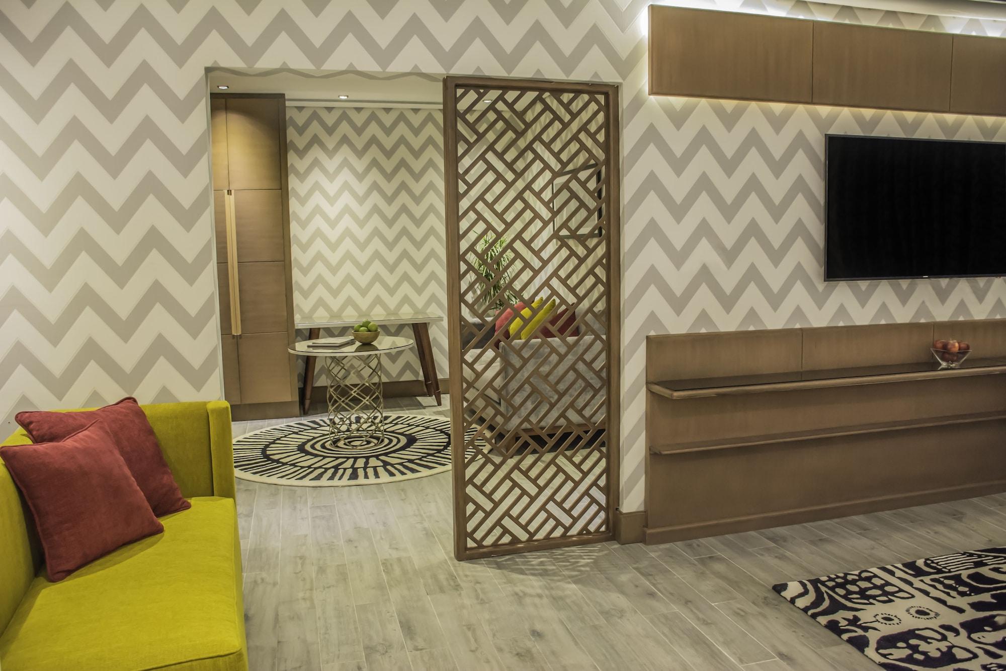 Radisson Blu Resort, Al Khobar Half Moon Bay Εξωτερικό φωτογραφία A room divider in a living room